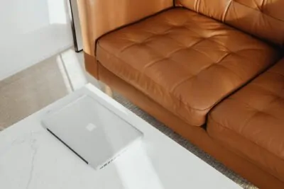 Quality leather sofa in a curated modern living room — investment furniture