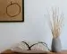 Japandi color palette interior with warm whites, oak wood and soft black accents