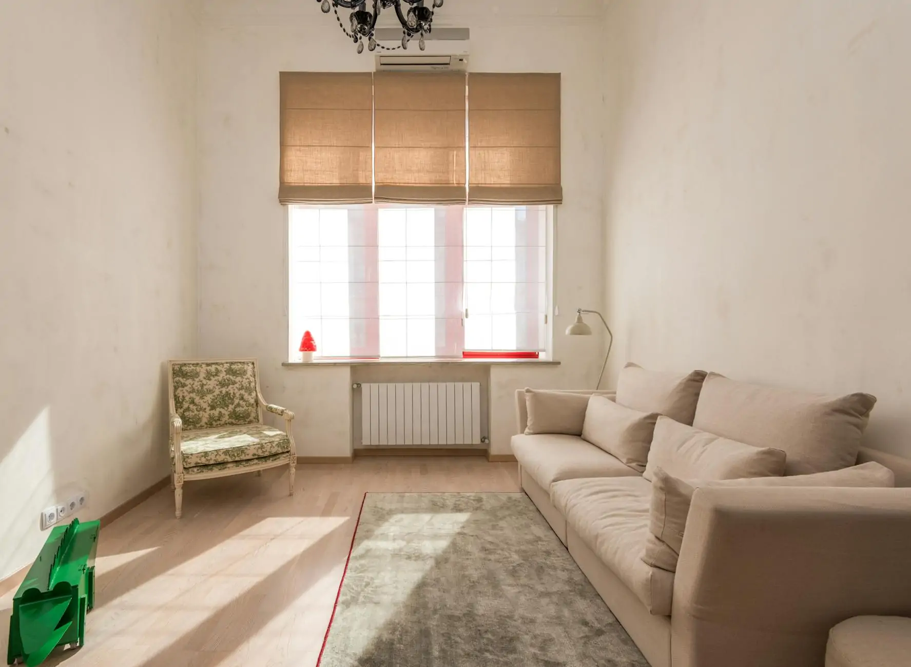 Neutral beige interior with linen sofa and oak coffee table — Japandi palette