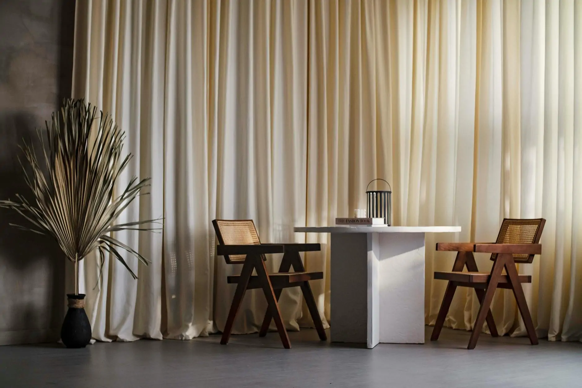 Japandi furniture: oak chair and low wooden bench in neutral interior
