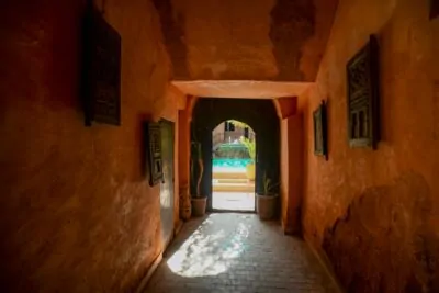 Mediterranean interior with whitewashed plaster walls and terracotta tile floors