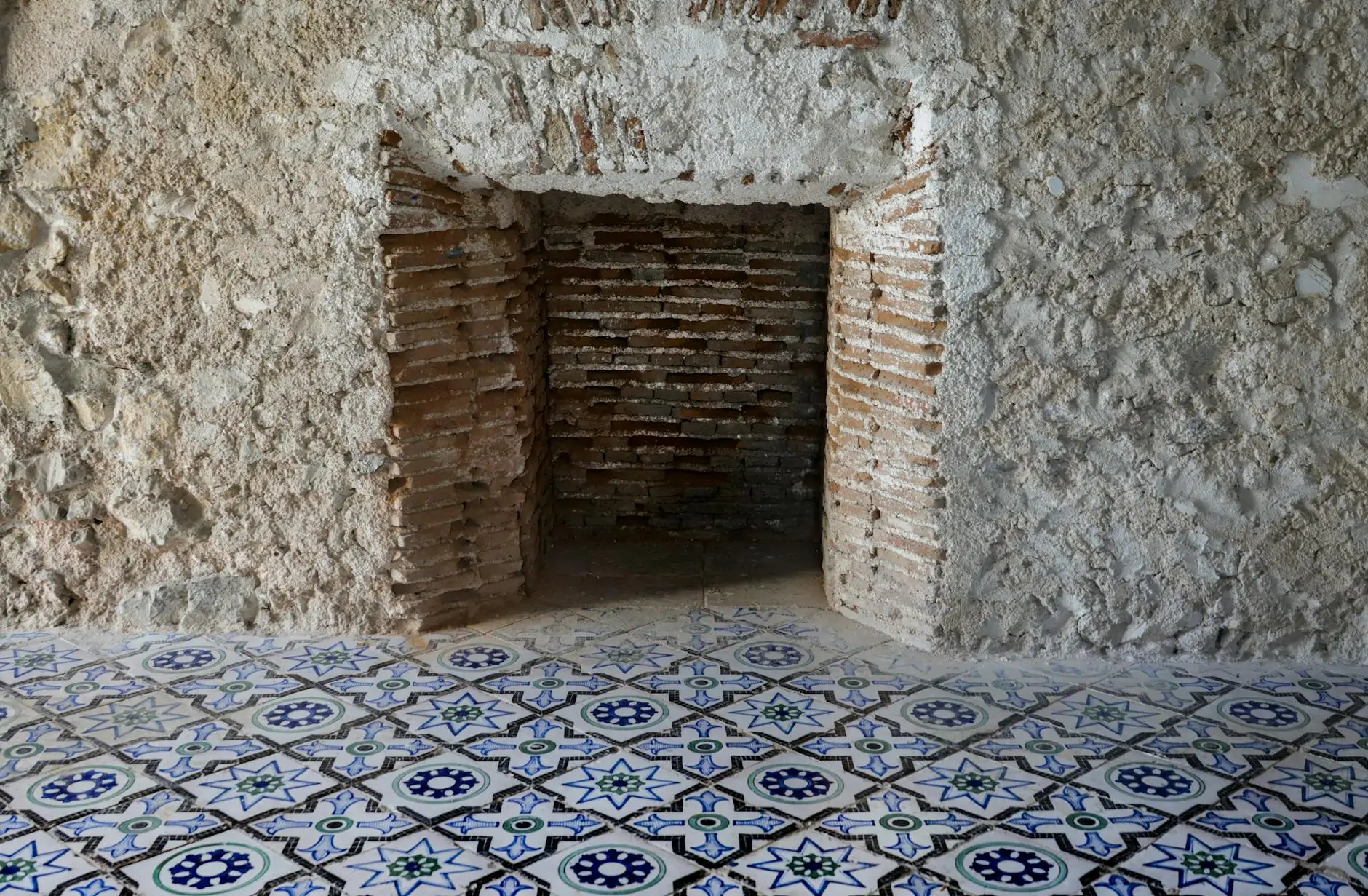 Mediterranean kitchen with terracotta tiles and olive wood counter