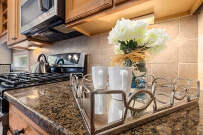 Calm coffee corner styling with mugs on a kitchen tray