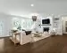 Bright staged living room with neutral decor and natural light market-ready home design updates kooihaus.com