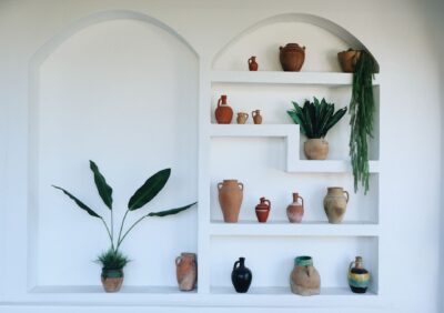 Terracotta pots styled with plants in a warm home decor setting