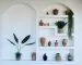 Terracotta pots styled with plants in a warm home decor setting