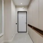 Integrated entryway cabinetry with a practical landing zone