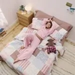 Hollister x Target dorm collection with pink patchwork bedding and matching loungewear