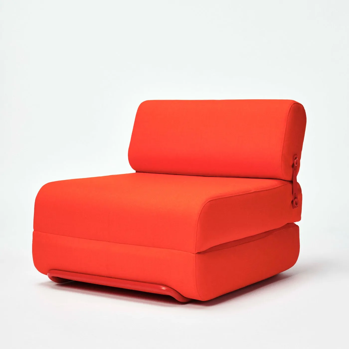 Red IKEA PS 2026 armless lounge chair on a white background