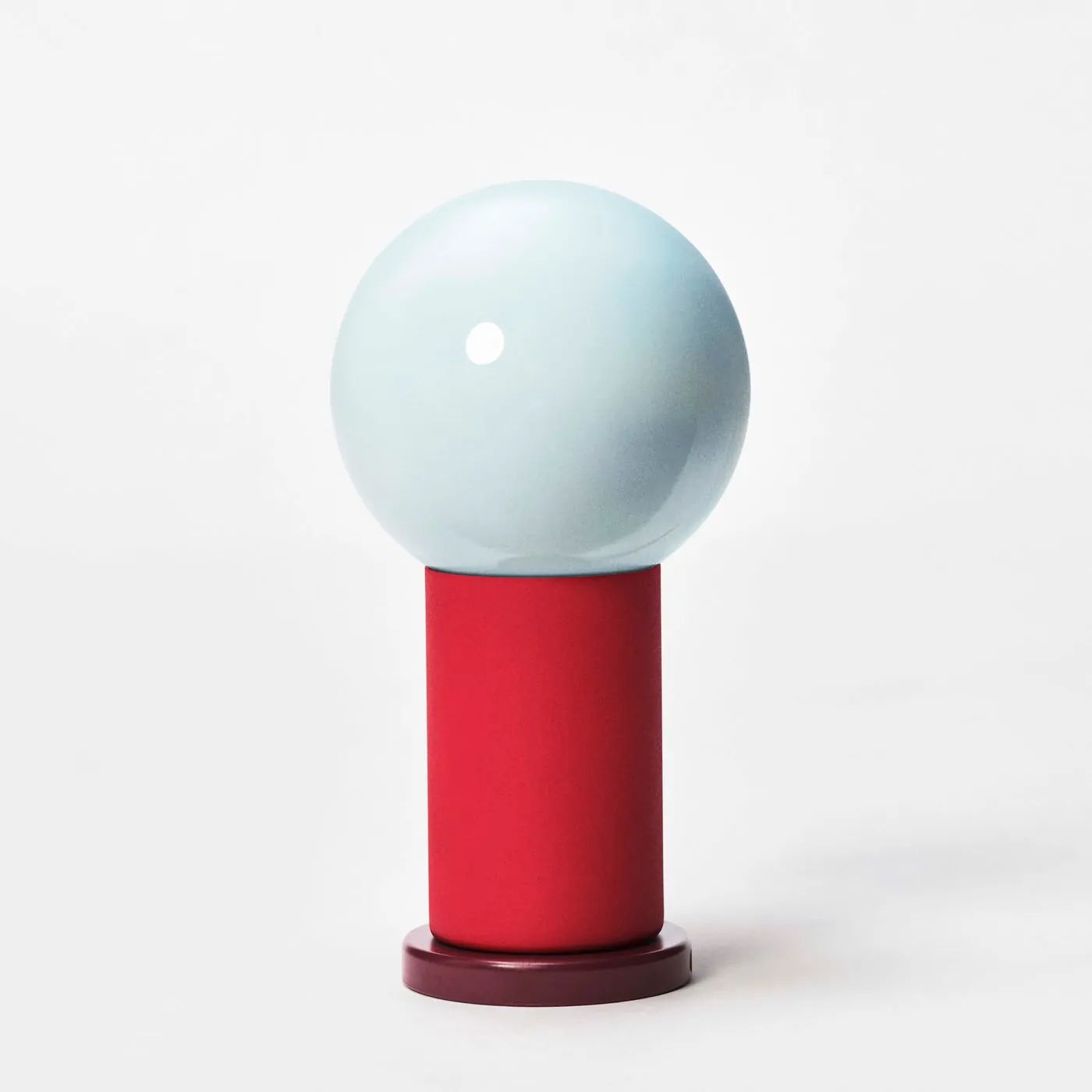 IKEA PS 2026 portable lamp with a pale blue globe and red base