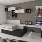 Compact room combining a bed and a dedicated desk workspace