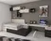 Compact room combining a bed and a dedicated desk workspace