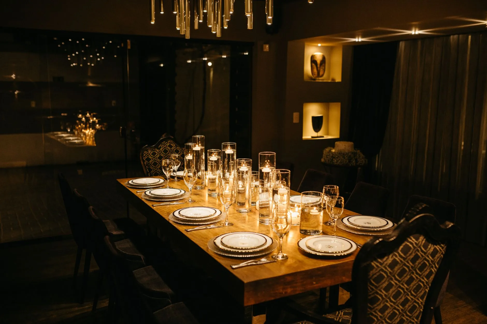 Candlelit dining table showing a warm, intimate evening atmosphere