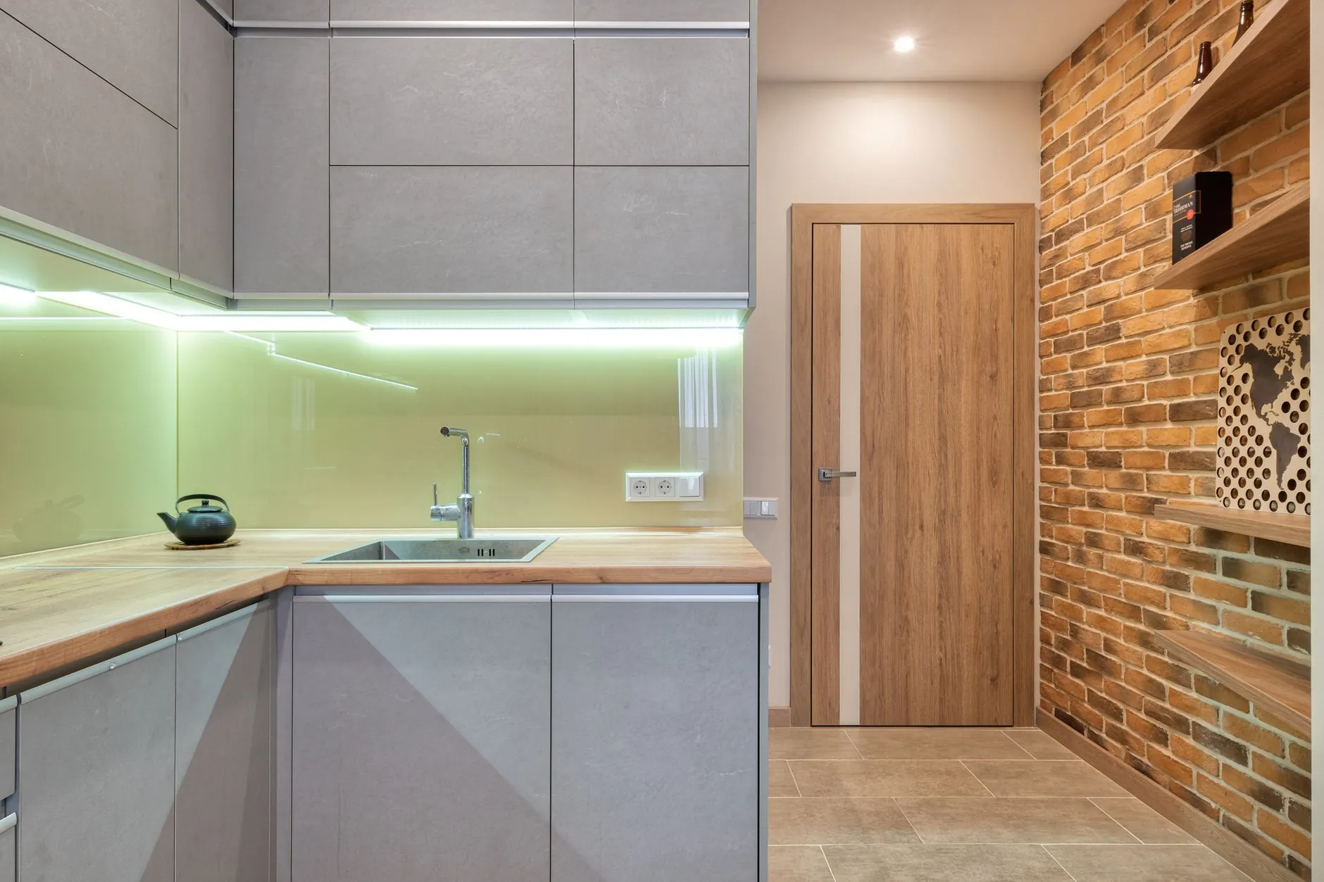 Contemporary kitchen with under-cabinet task lighting above the worktop