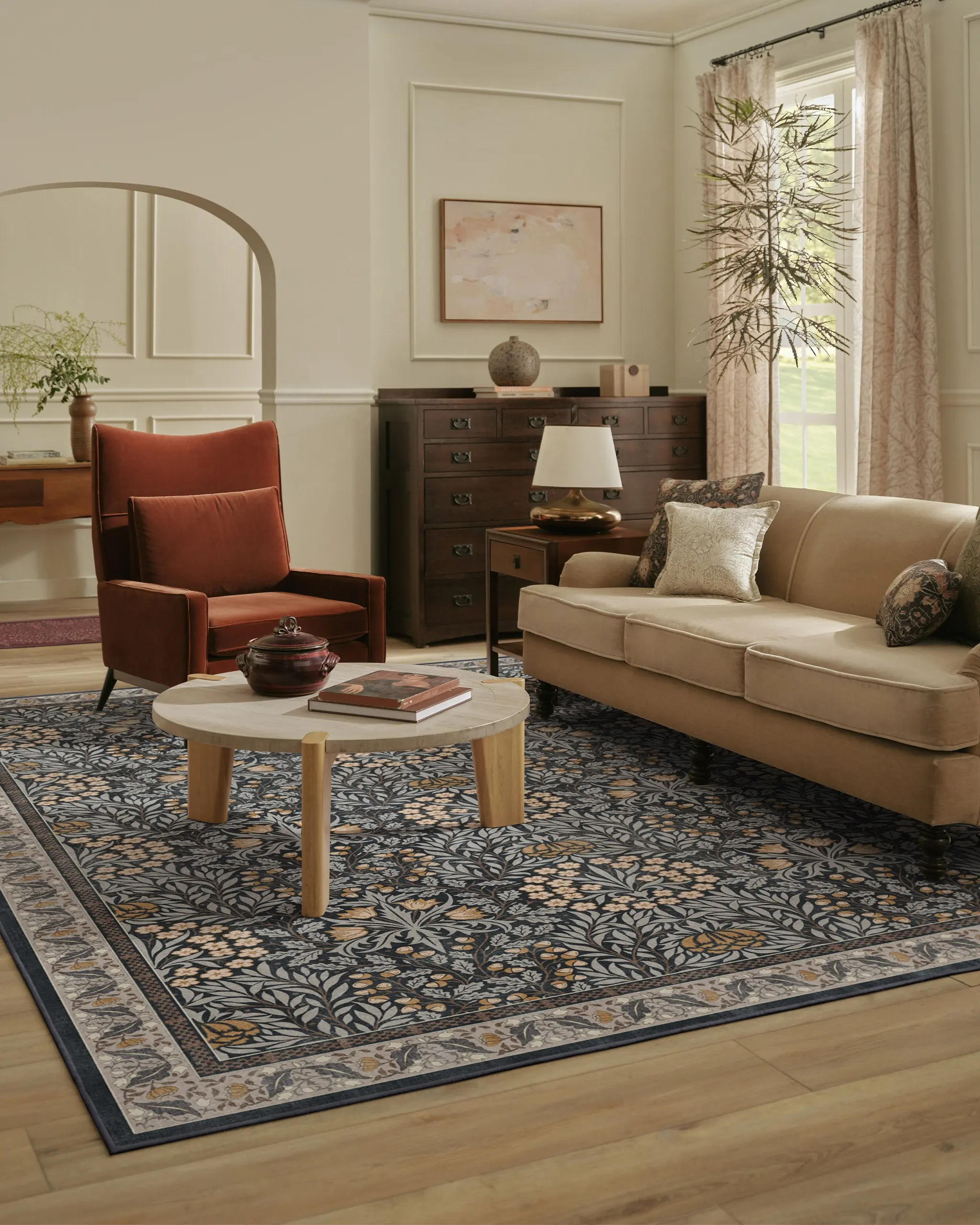 Daisy and Oak Charcoal rug by Morris and Co in a warm living room