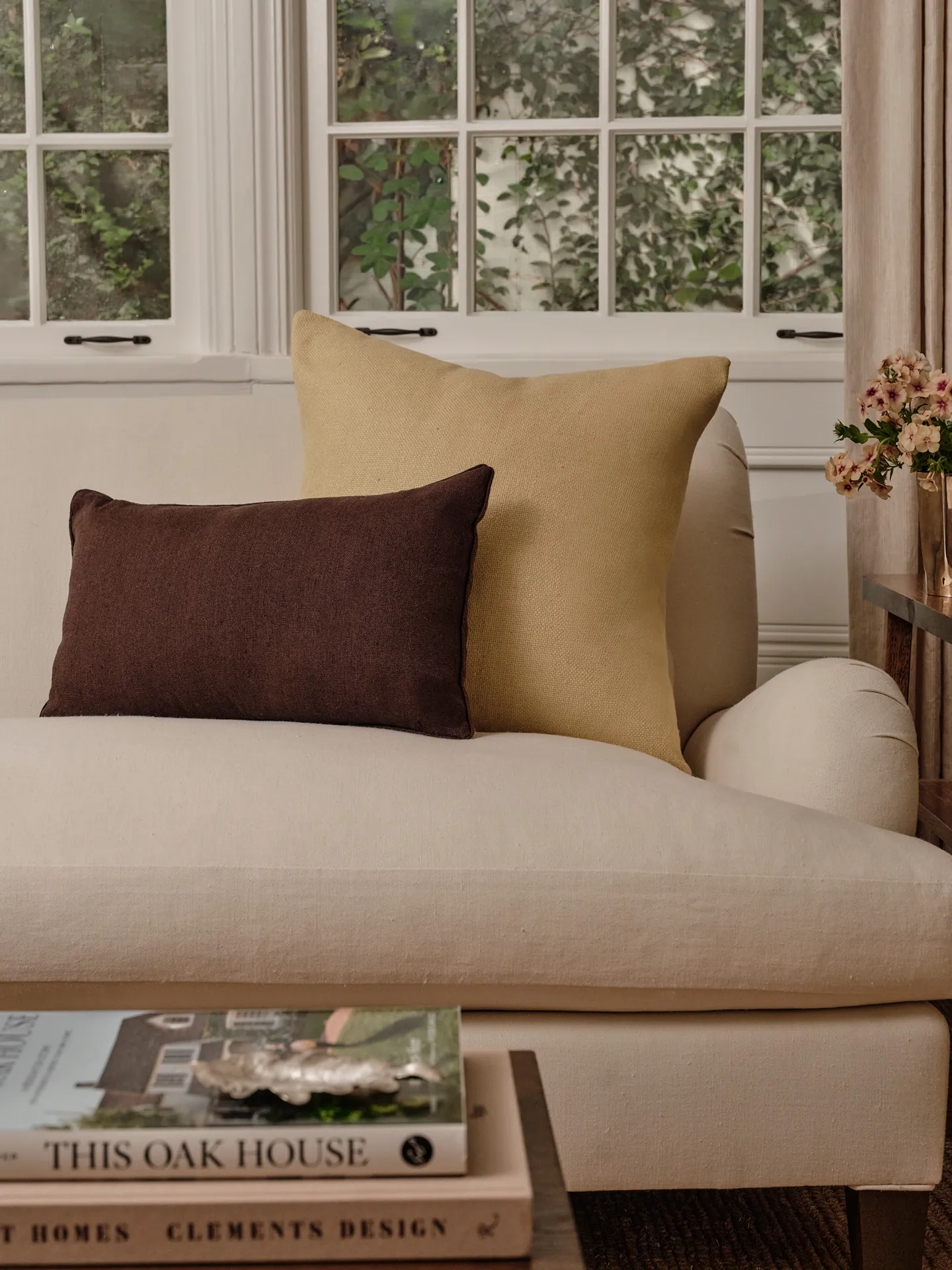 Living room styled with layered pillows from the Target This Oak House collection