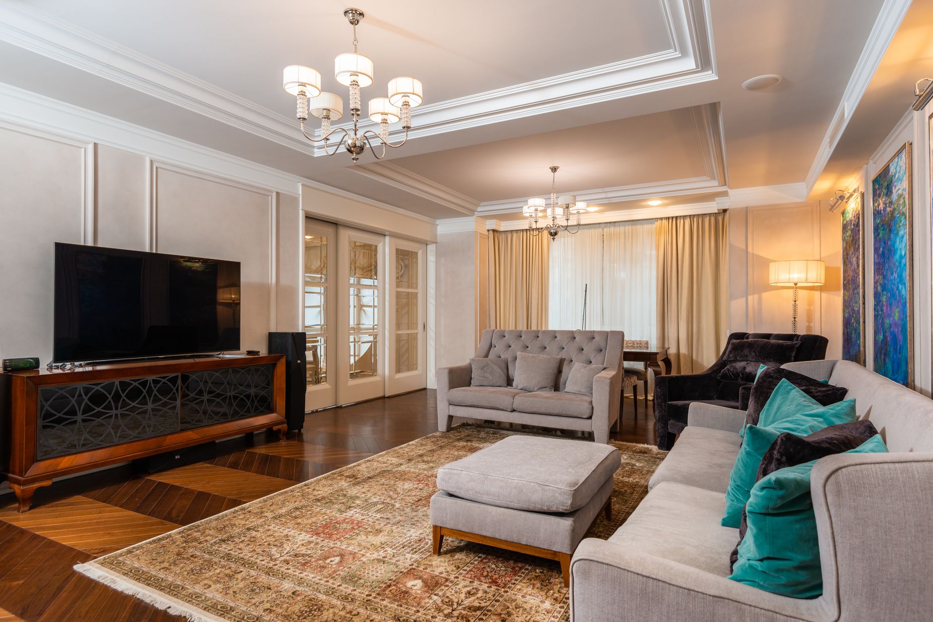 Living room seating arranged around a television with space to circulate