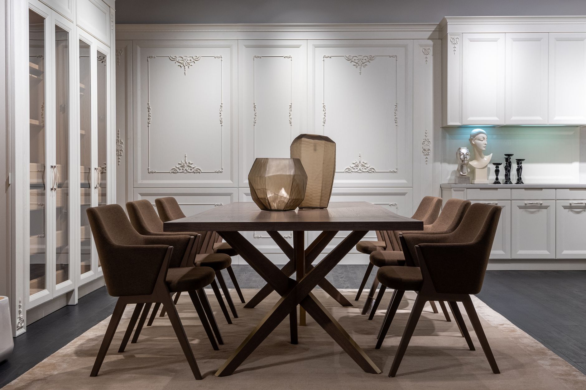 Brown upholstered dining chairs around a large wooden table